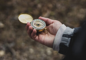 Hand Holding a Compass (2)